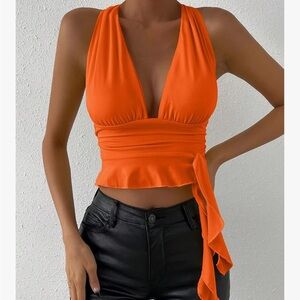 New deep v-neck pull-on halter top. Bright orange. Medium.